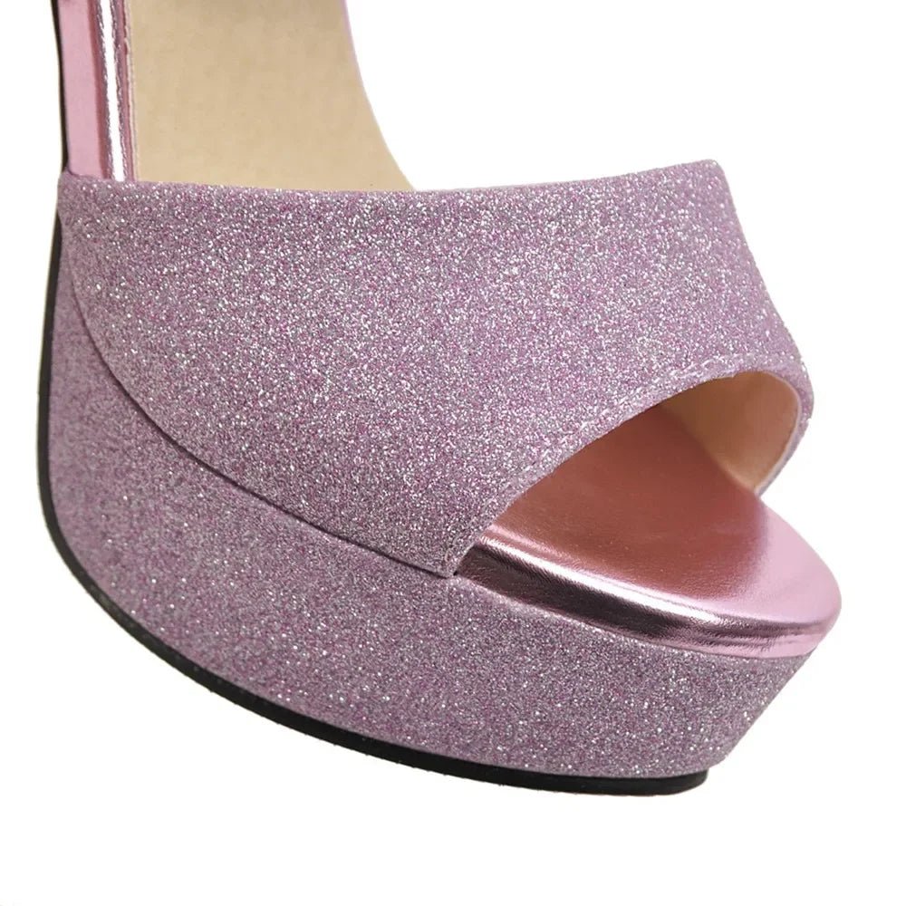 Purple glittery high heel shoe on a white background