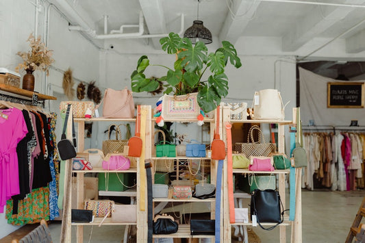 a room filled with handbags and other clothing accessories