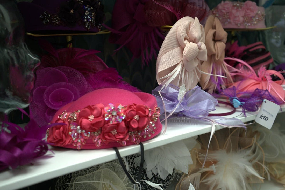 Hats and fascinators are on display.