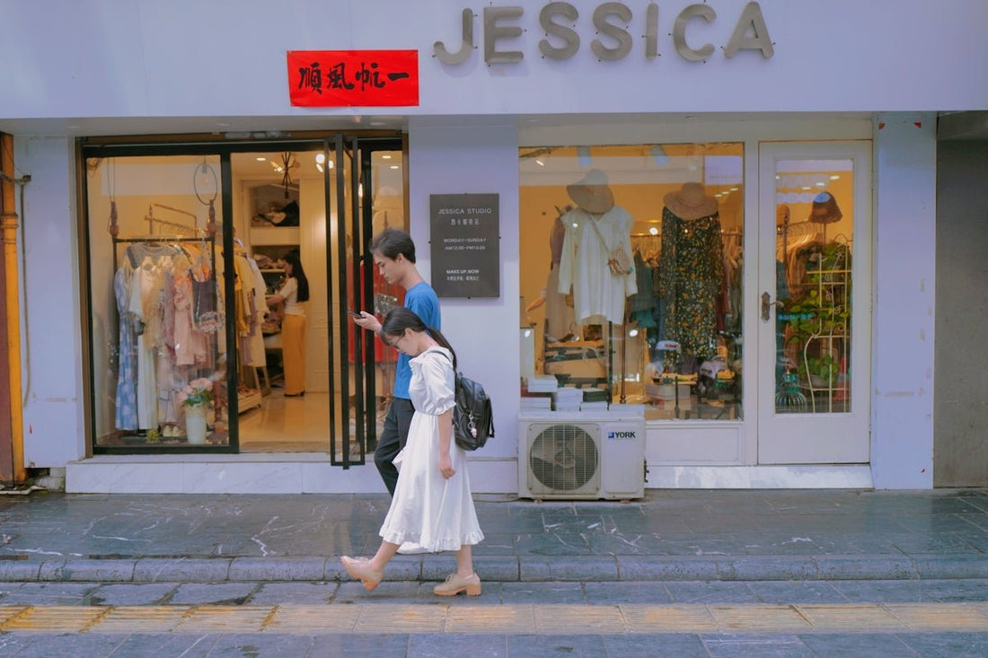 man in white dress shirt and woman in white dress walking on sidewalk during daytime