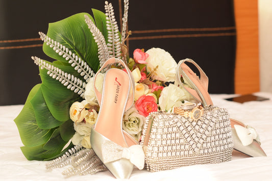 Bridal bouquet, shoes and purse ready for the wedding.