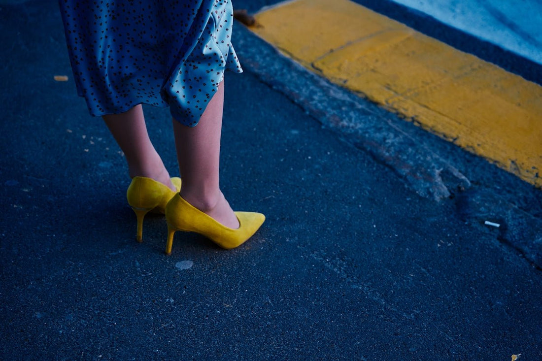 a person wearing yellow sandals