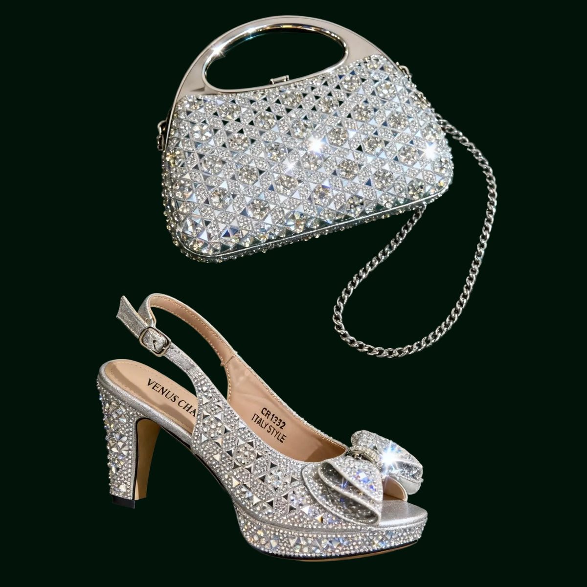 Silver studded handbag and high-heeled shoe against a green background