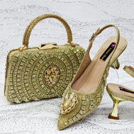 Gold Butterfly Slingback Sandals & Bag Set – 2025 Wedding Party on a textured white surface