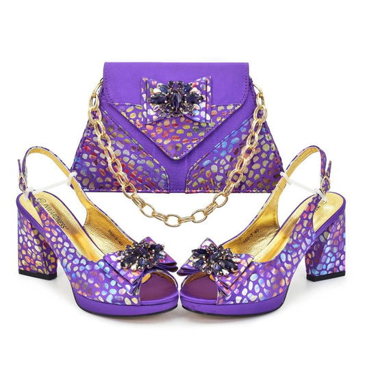 Purple high-heeled Chic Italian Shoes & Bag Set with Stones for Parties with a metallic iridescent pattern, the matching handbag has a gold chain strap, displayed on a white background.