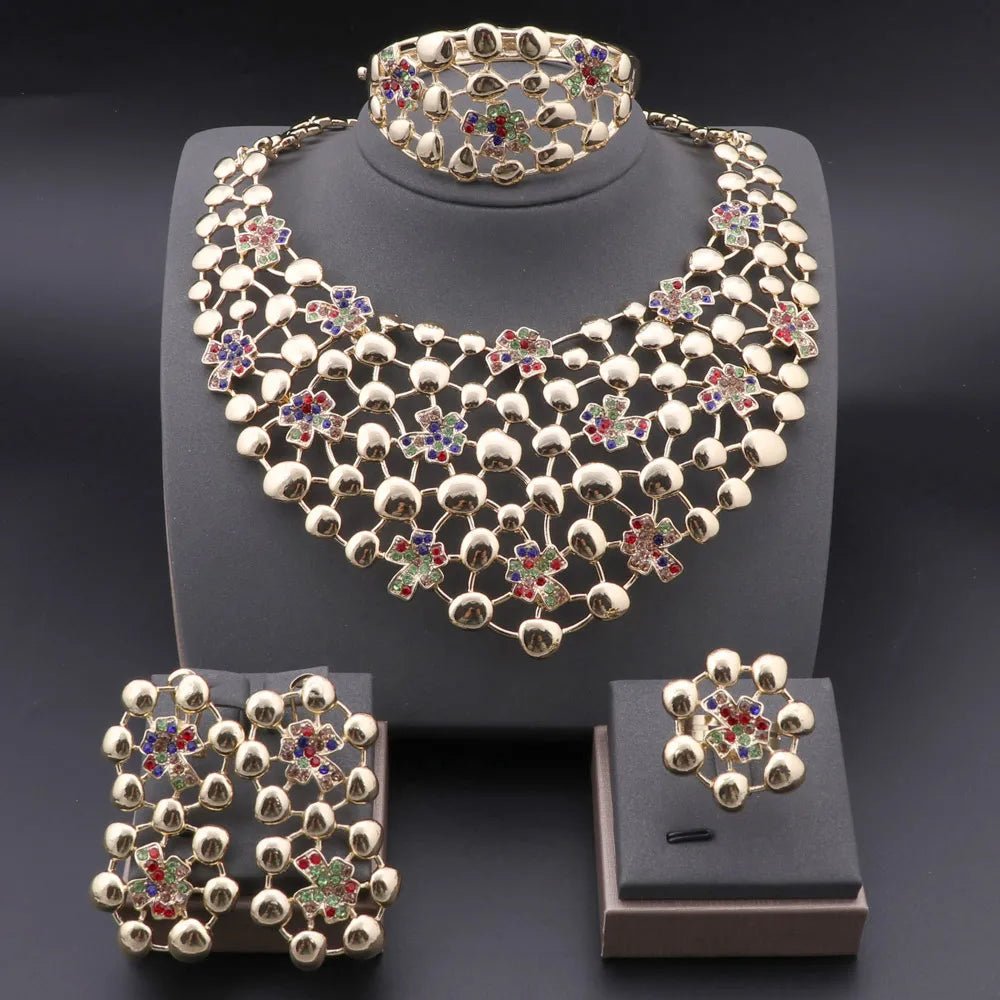 Muti-color jewelry set with necklace, earrings, ring and bracelet on a dark background