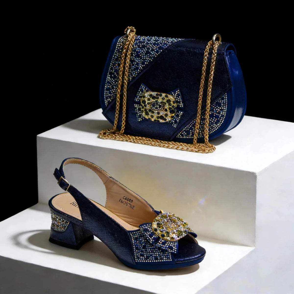 Navy blue Italian High Heel Shoe and Bag Set – Elegant Party Style with gold embellishments on a white platform.