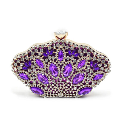 Elegant clutch bag with purple gemstones on a white background