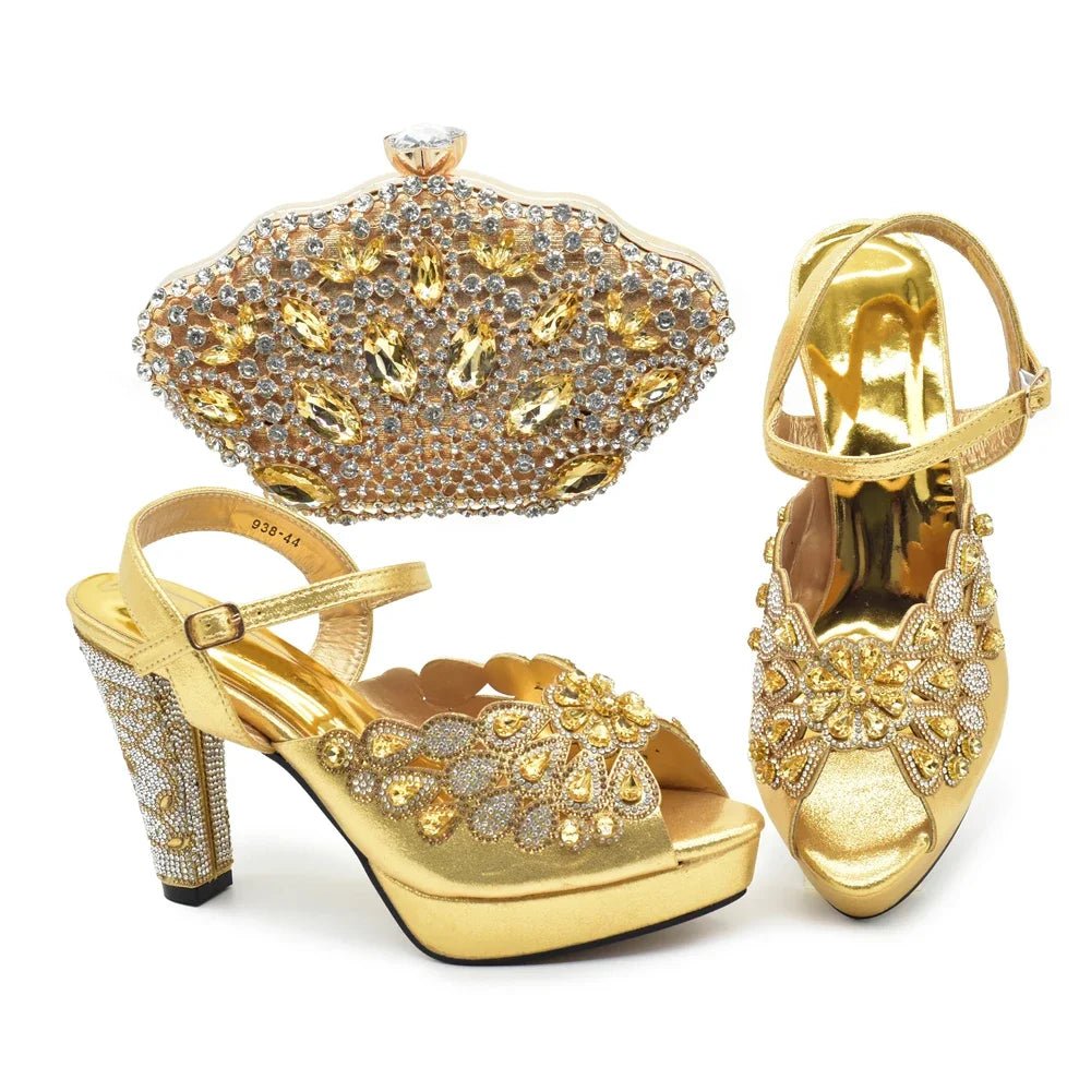 Gold high-heeled shoes and matching clutch with intricate designs on a white background