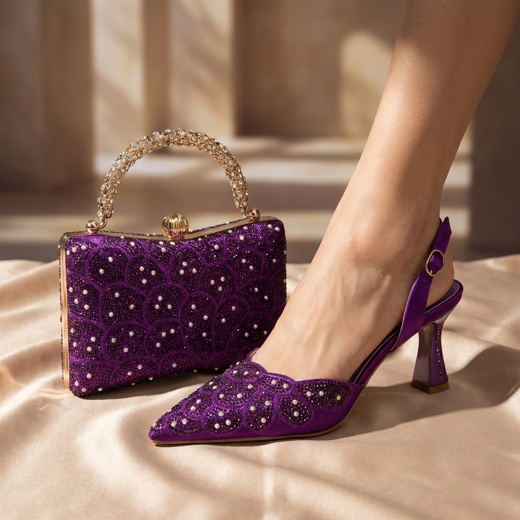 Elegant Italian heels and matching bag set with rhinestone embellishments, featuring a pointed toe, slingback strap, and metallic-handle bag in a sophisticated setting.