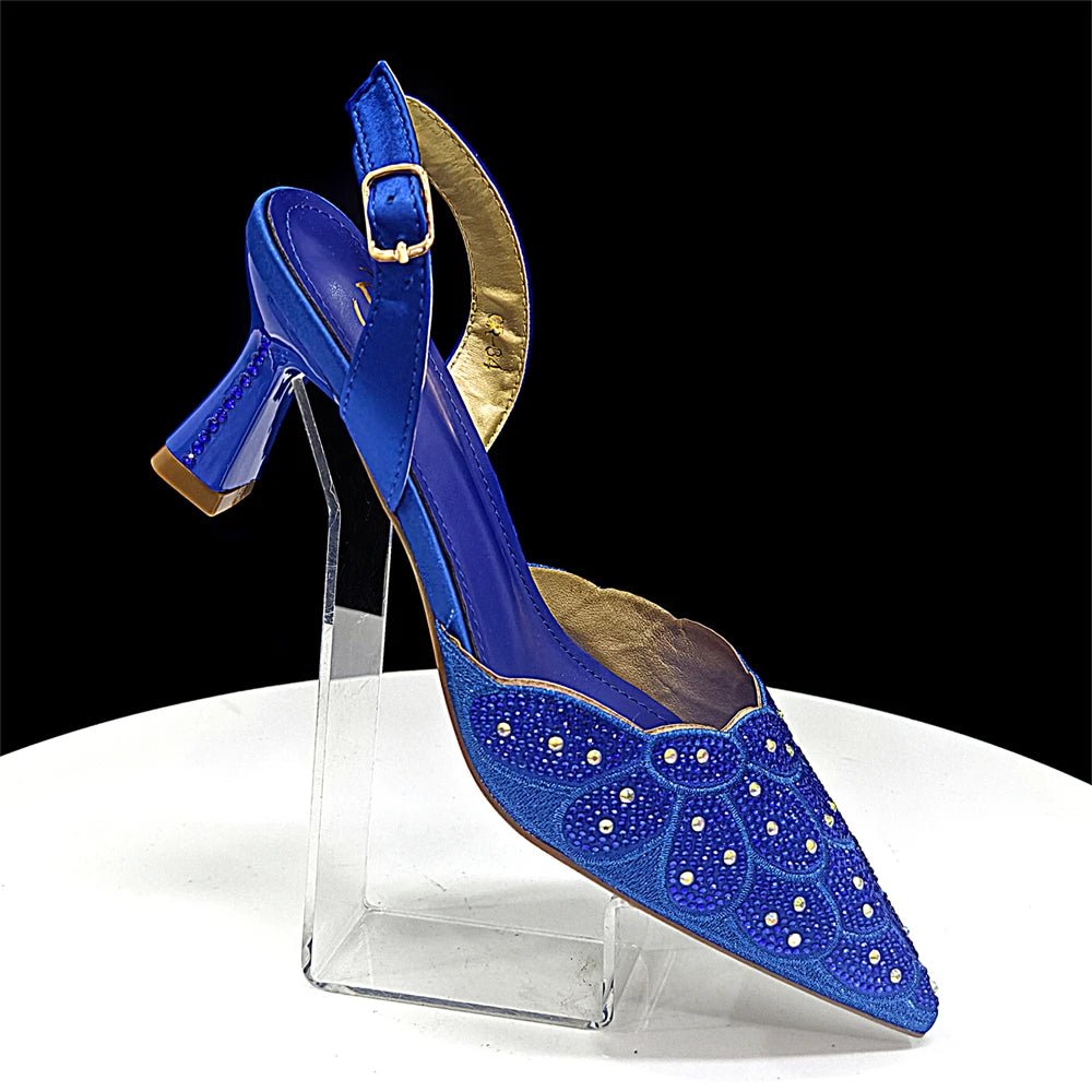 Blue Italian Heels and Matching Bag Set – Elegant Rhinestone, on a clear stand against a black background