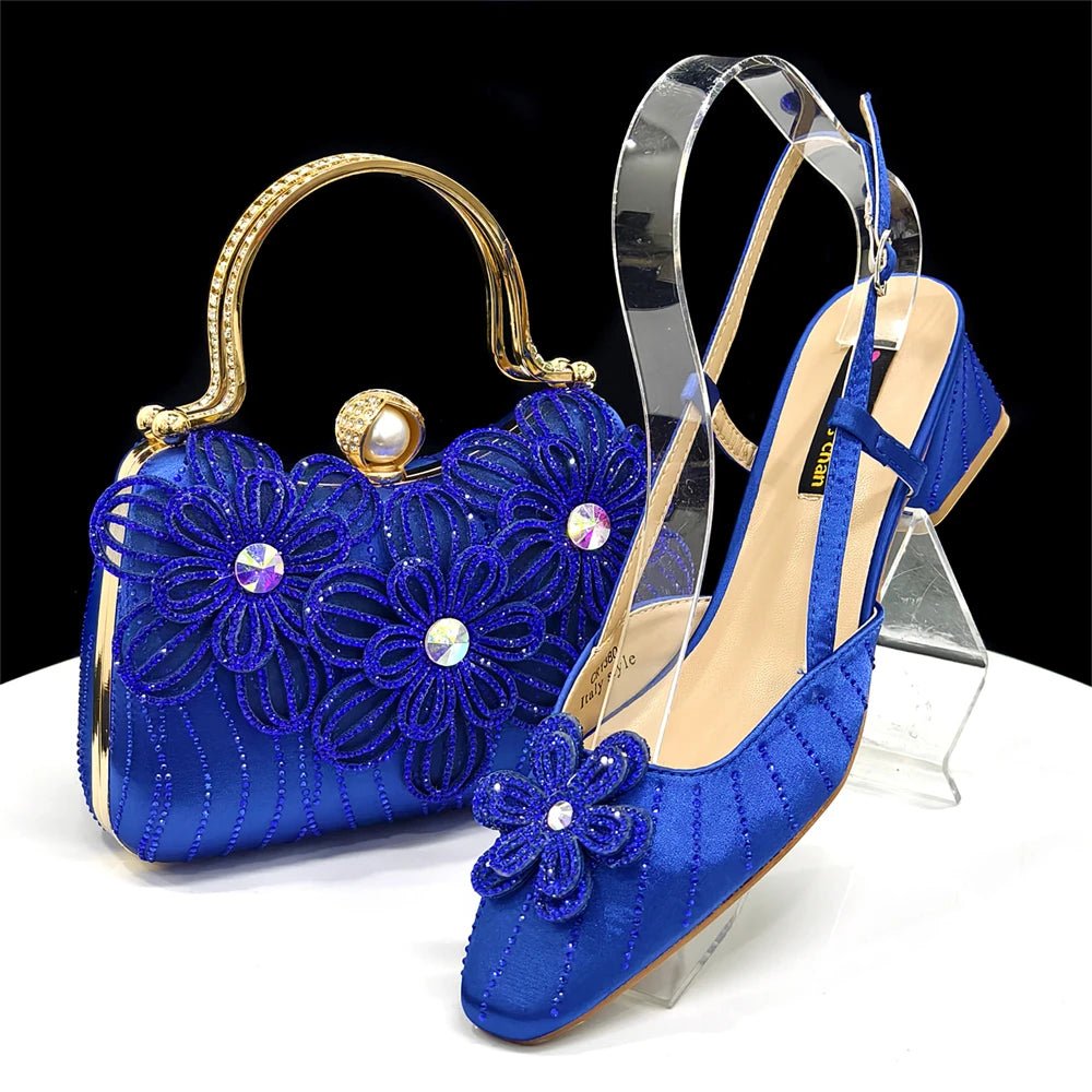 Blue floral Italian Rhinestone Heels & Clutch Bag Set | Elegant Wedding on a clear stand with a black background