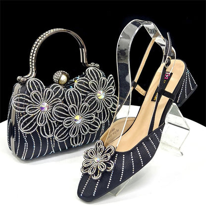Black Italian Rhinestone Heels & Clutch Bag Set | Elegant Weddingt with floral designs on a white background