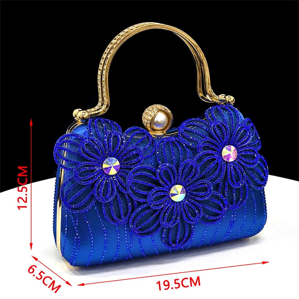 Blue Italian Rhinestone Clutch Bag with floral accents  on a black background
