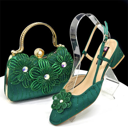 Green embroidered Italian Rhinestone Heels & Clutch Bag Set | Elegant Wedding on a clear stand with a black background