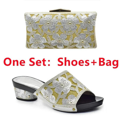 Pair of Silver Floral Trendy Italian Design Slip-on Shoes and Matching Bag for Women on a white background