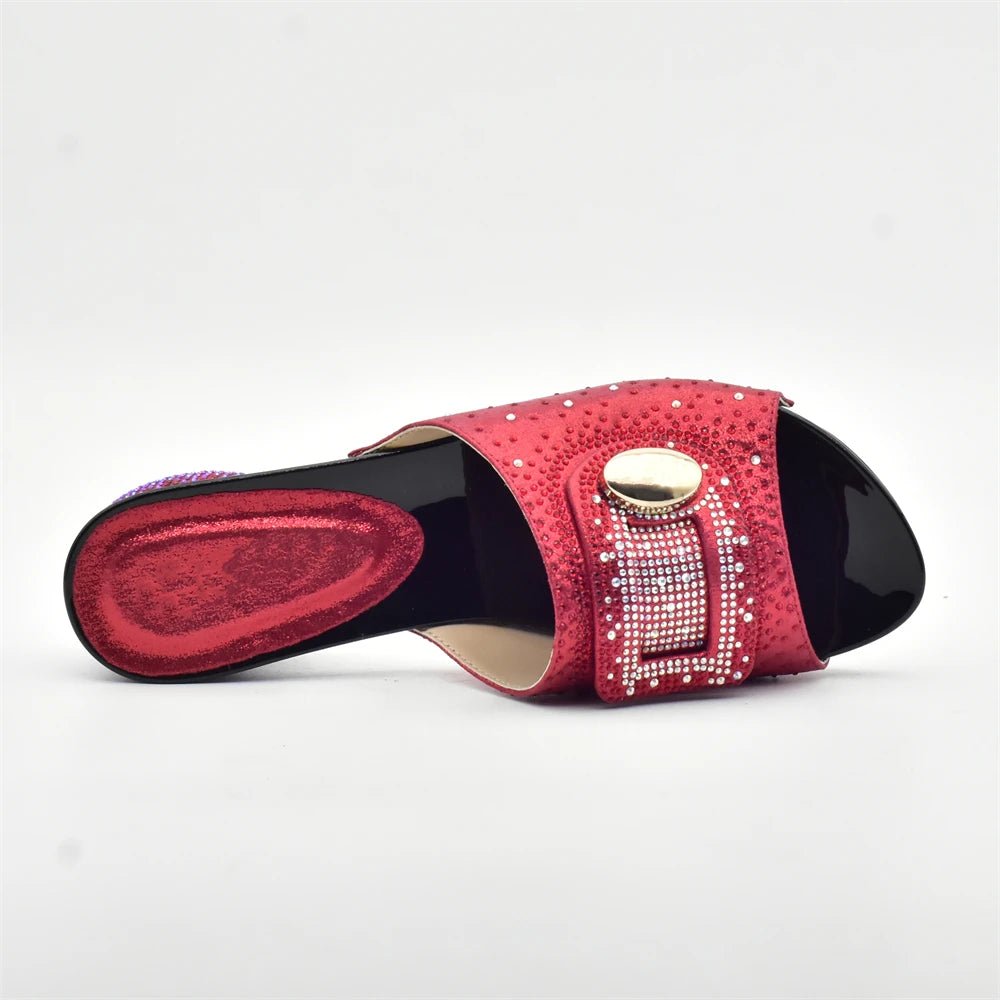 Red Trendy Italian Design Slip-on Shoe with rhinestone details on a white background